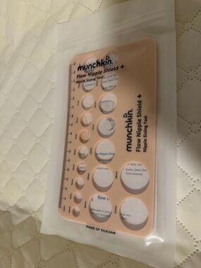 Munchkin Flow Nipple Shield + Silicone Sizing Tool in Peach